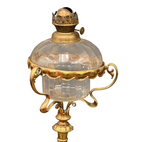 405A - A 19th Century Victorian brass Art Nouveau oil floor lamp with glass bowl. 146cm