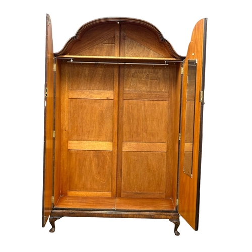 524A - A good quality 1930’s burr walnut fitted wardrobe. 125x56x202cm