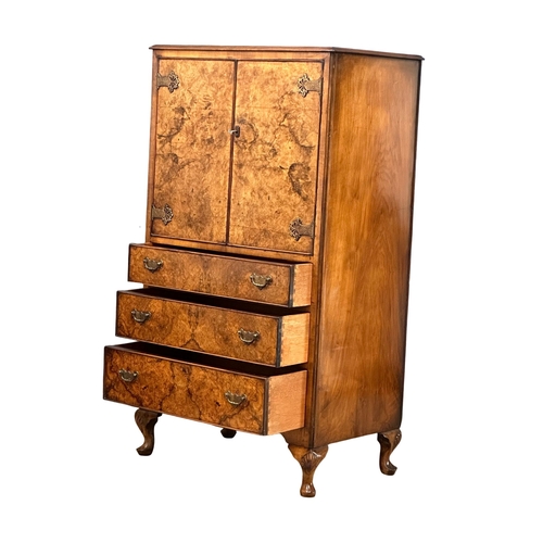 524C - A good quality 1930’s burr walnut cocktail cabinet/tallboy. 77x50x138cm