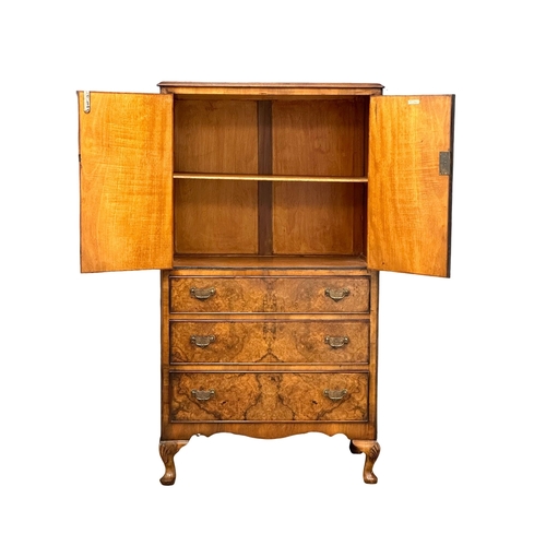 524C - A good quality 1930’s burr walnut cocktail cabinet/tallboy. 77x50x138cm