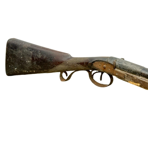 569C - An Early 20th Century training rifle. 118cm