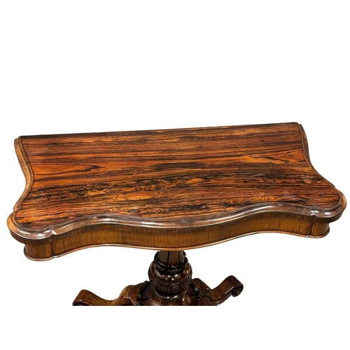 870A - A 19th Century Victorian rosewood turnover tea table. 92x46x74cm. 2