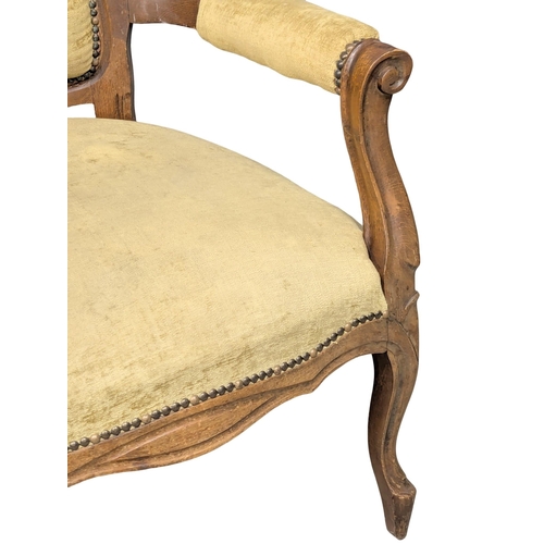 880 - A pair of french style deep button back open armchairs. 68x107cm