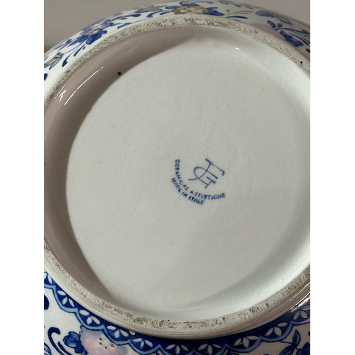 667 - A Francesco Guarino pottery vase. Italy. 30cm