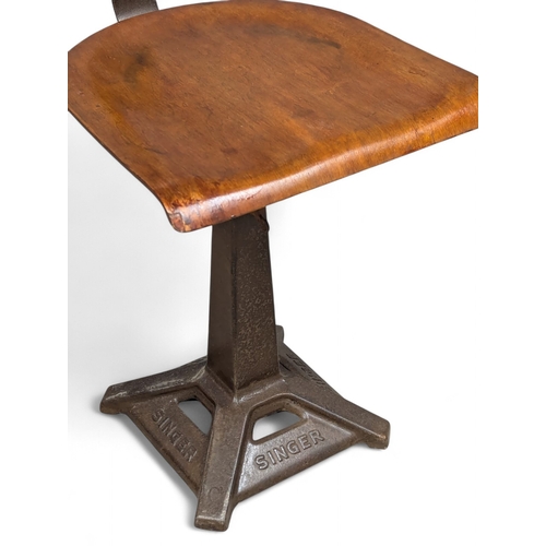 An Early 20th Century swivel Singer machinist chair (1)