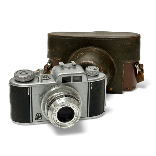 A collection of cameras. Early-Mid 20th Century. Aka Relle, Voigtlander ...