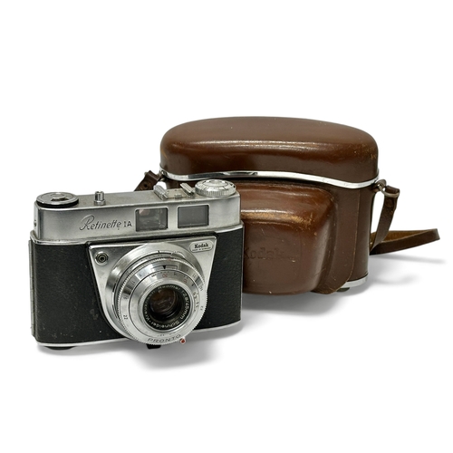 A collection of cameras. Early-Mid 20th Century. Aka Relle, Voigtlander ...