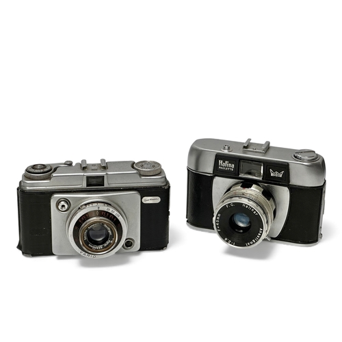A collection of cameras. Early-Mid 20th Century. Aka Relle, Voigtlander ...