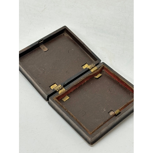 A late 19th century early plastic folding frame 6.5x7.5cm