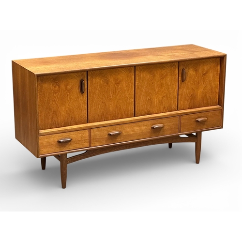 A GPlan Brasilia teak sideboard. Designed by Victor Wilkins, C.1964-70. 145x45.5x82cm. (9)