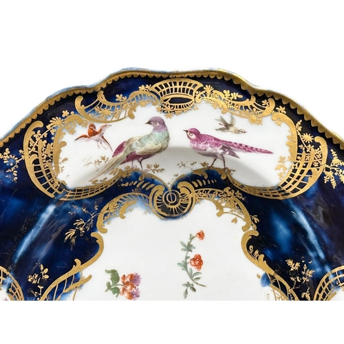 98 - Chelsea, C.1760. A Mazarine Ground Platter. 18th Century. Gold Anchor Mark. A central white reserve ... 