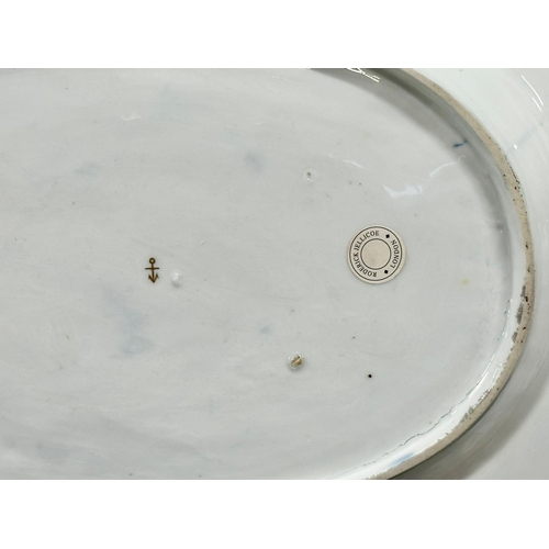 98 - Chelsea, C.1760. A Mazarine Ground Platter. 18th Century. Gold Anchor Mark. A central white reserve ... 