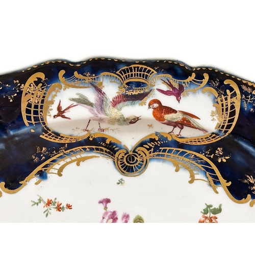98 - Chelsea, C.1760. A Mazarine Ground Platter. 18th Century. Gold Anchor Mark. A central white reserve ... 