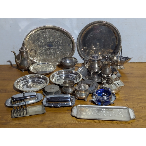 263 - Quantity of EPNS serving trays, coffee and tea pot, butter dishes etc