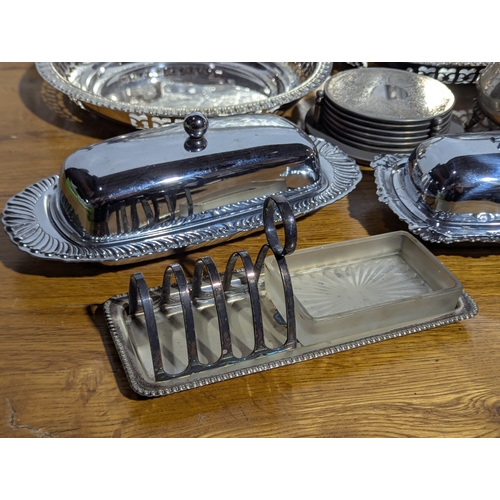 263 - Quantity of EPNS serving trays, coffee and tea pot, butter dishes etc