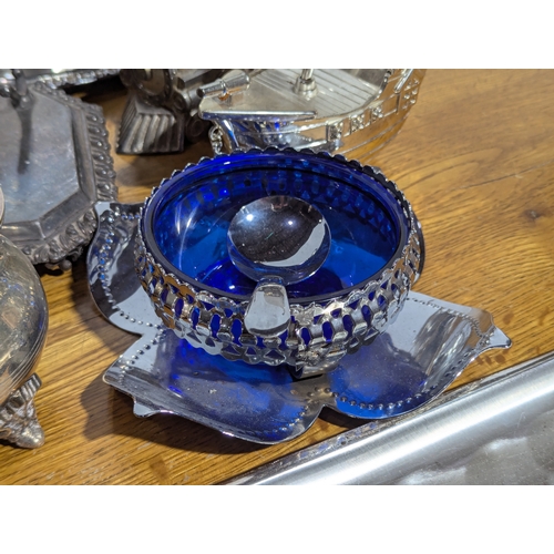 263 - Quantity of EPNS serving trays, coffee and tea pot, butter dishes etc