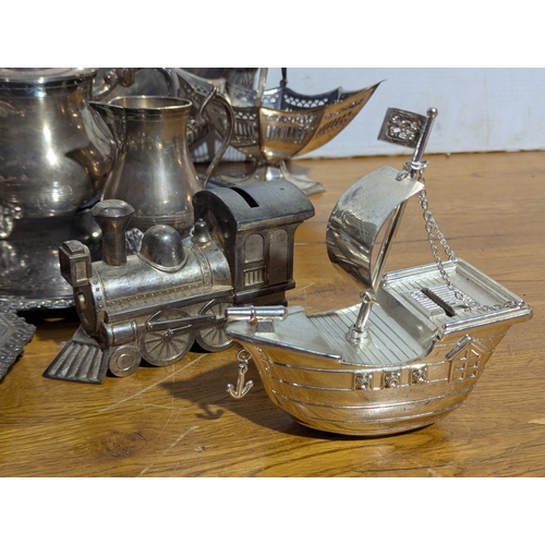 263 - Quantity of EPNS serving trays, coffee and tea pot, butter dishes etc