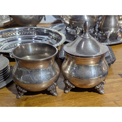 263 - Quantity of EPNS serving trays, coffee and tea pot, butter dishes etc