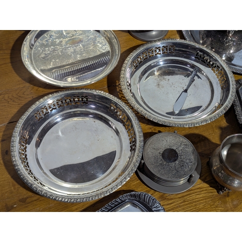 263 - Quantity of EPNS serving trays, coffee and tea pot, butter dishes etc