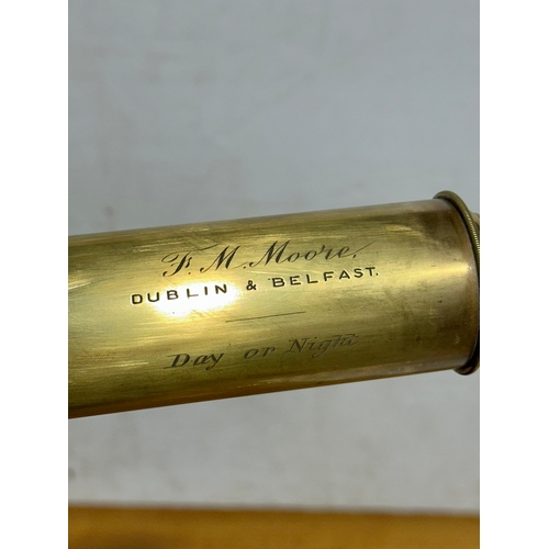 5 - A large brass and leather bound telescope by F. M. Moore, Dublin & Belfast. 90cm.