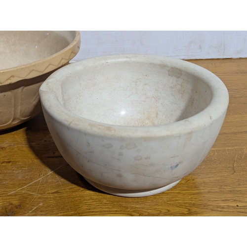 15 - Large early 20th century mortars with a vintage baking bowl