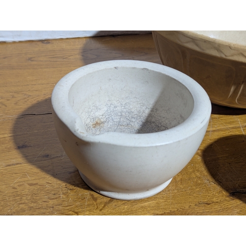 15 - Large early 20th century mortars with a vintage baking bowl