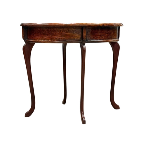 45 - A mahogany occasional table. C.1930-50. 61x44.5x54cm. (5)