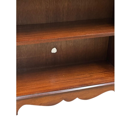 30 - A Georgian style inlaid mahogany open bookcase with two drawers. 76x28x77cm. 5