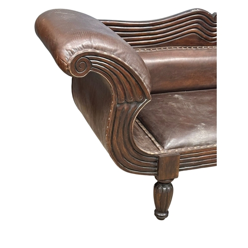 4 - A large Early 19th Century style double end sofa, 223cm.