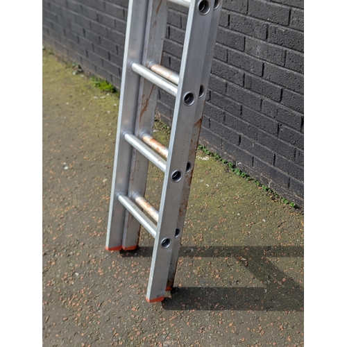 37 - Large extending alloy ladders. 341cm unextended
