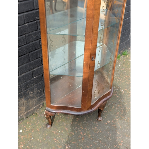 221 - A vintage china cabinet
