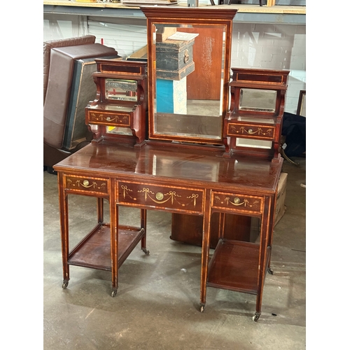 223 - A large Edwardian inlaid mahogany dressing table. 122x60.5x162cm.