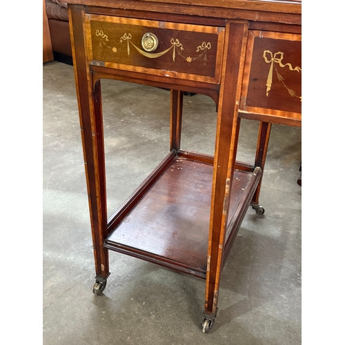 223 - A large Edwardian inlaid mahogany dressing table. 122x60.5x162cm.