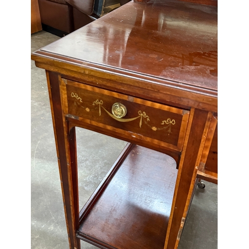 223 - A large Edwardian inlaid mahogany dressing table. 122x60.5x162cm.