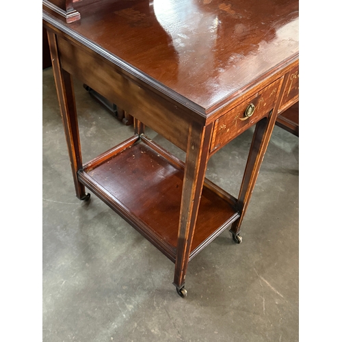 223 - A large Edwardian inlaid mahogany dressing table. 122x60.5x162cm.