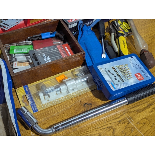 231 - Quantity of tools including 2 tool boxes, electric sander, Everest spanners set, drill bits etc