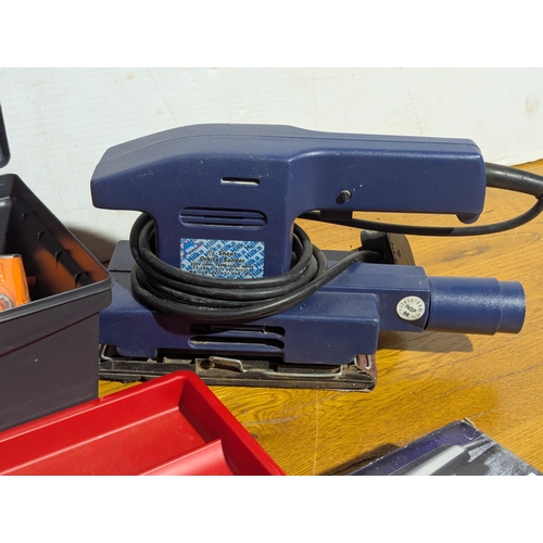 231 - Quantity of tools including 2 tool boxes, electric sander, Everest spanners set, drill bits etc
