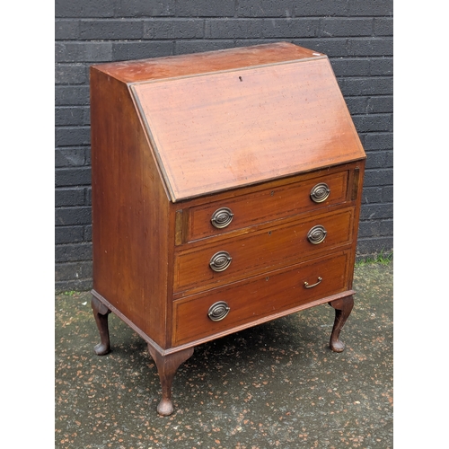 235 - A vintage inlaid bureau.