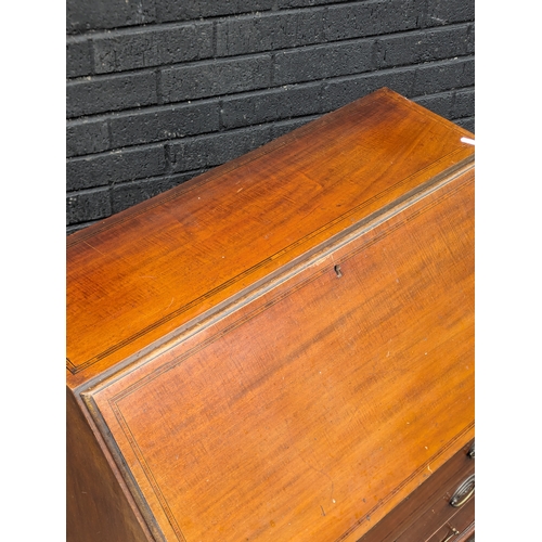 235 - A vintage inlaid bureau.