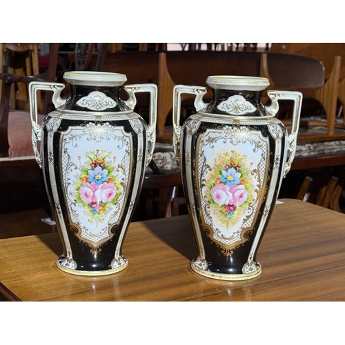 237 - A pair of Noritake pottery vases. 30cm.