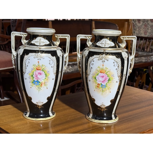 237 - A pair of Noritake pottery vases. 30cm.