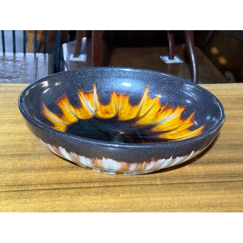 239 - A mid century glazed stoneware bowl. Unmarked.  30x7.5cm