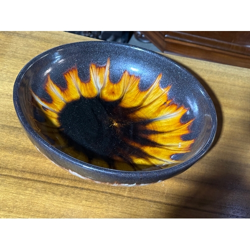 239 - A mid century glazed stoneware bowl. Unmarked.  30x7.5cm