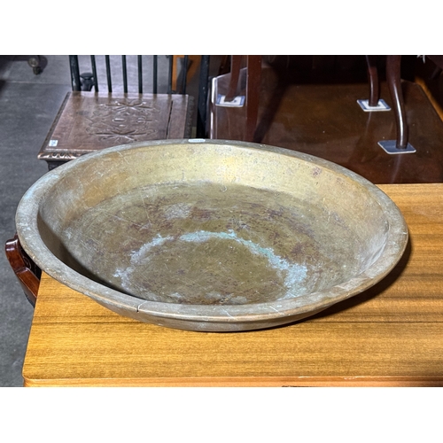 240 - A large early 20th century brass ceremonial bowl. 48.5x7.5cm.
