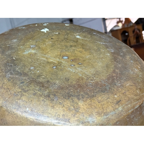 240 - A large early 20th century brass ceremonial bowl. 48.5x7.5cm.