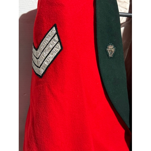 27 - A UDR dress coat.