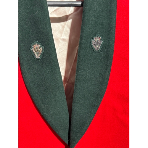 27 - A UDR dress coat.