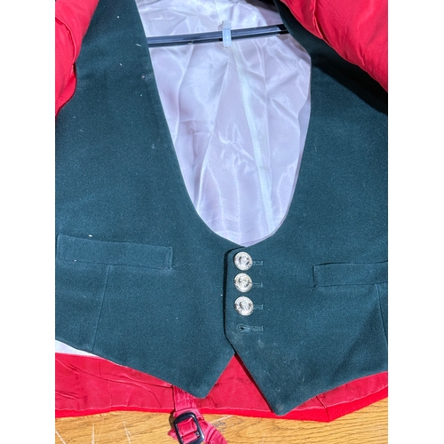 27 - A UDR dress coat.