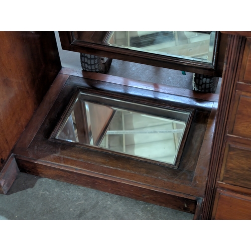 25 - A large late Victorian walnut pedestal dressing table, 153cm X 59cm X 197cm