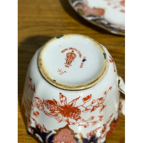 29 - A pair of Royal Crown Derby Imari Fern cups and saucers. C.1900.
